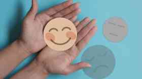 Smiling face in hands