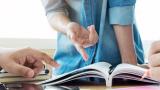 Teacher with a book